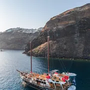 Hiking trail up the bare volcanic crater rim of Nea Kameni visited on Santorini boat tours, Greece